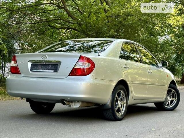 Серый Тойота Камри, объемом двигателя 2.36 л и пробегом 213 тыс. км за 6300 $, фото 25 на Automoto.ua