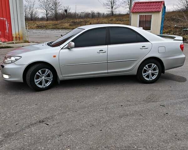 Сірий Тойота Камрі, об'ємом двигуна 3 л та пробігом 317 тис. км за 7700 $, фото 7 на Automoto.ua