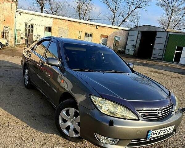 Серый Тойота Камри, объемом двигателя 2.4 л и пробегом 302 тыс. км за 4999 $, фото 11 на Automoto.ua