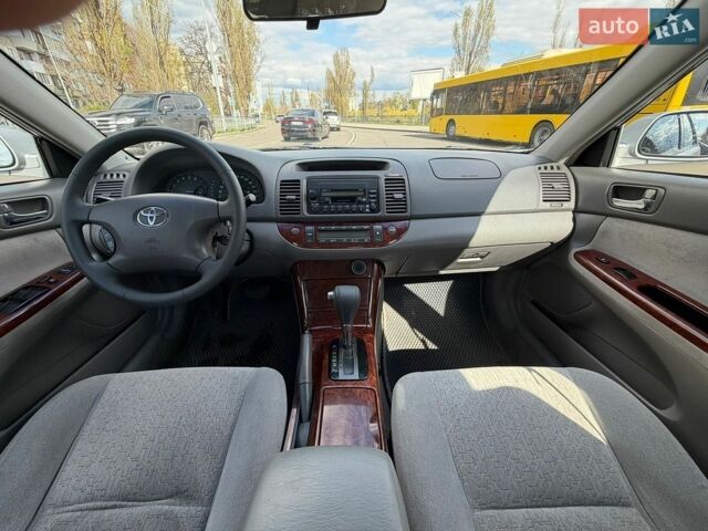Сірий Тойота Камрі, об'ємом двигуна 3 л та пробігом 465 тис. км за 5900 $, фото 4 на Automoto.ua