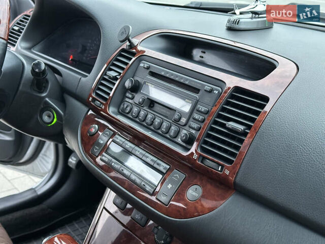 Серый Тойота Камри, объемом двигателя 2.36 л и пробегом 220 тыс. км за 6200 $, фото 38 на Automoto.ua