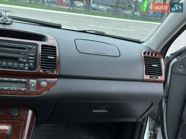 Серый Тойота Камри, объемом двигателя 2.36 л и пробегом 220 тыс. км за 6200 $, фото 32 на Automoto.ua