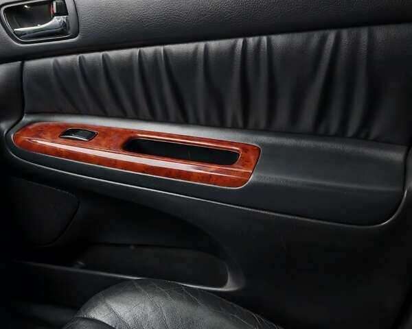 Сірий Тойота Камрі, об'ємом двигуна 3 л та пробігом 317 тис. км за 7700 $, фото 73 на Automoto.ua