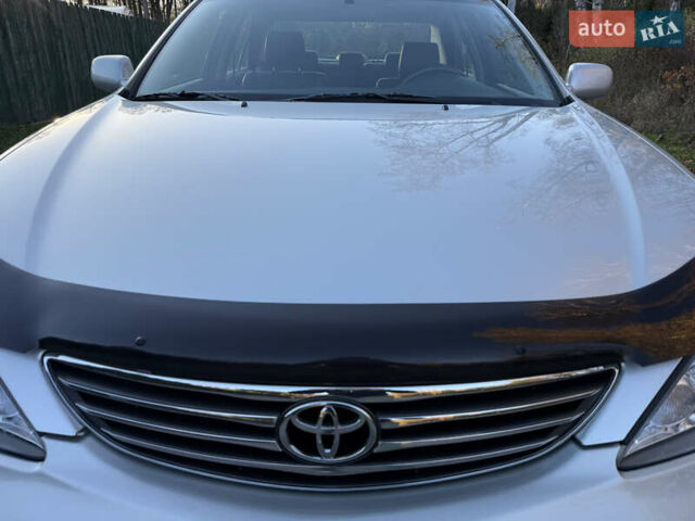 Серый Тойота Камри, объемом двигателя 2.4 л и пробегом 42 тыс. км за 10900 $, фото 29 на Automoto.ua