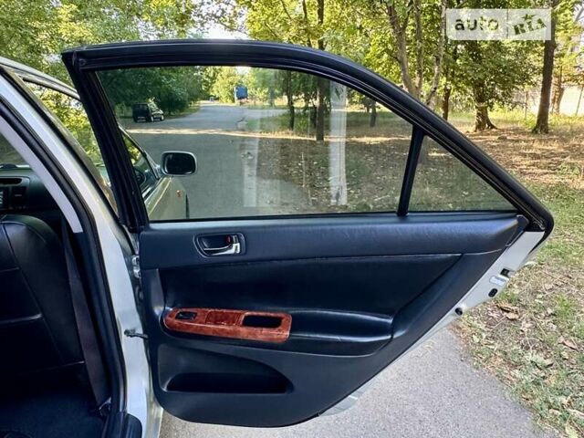 Серый Тойота Камри, объемом двигателя 2.36 л и пробегом 213 тыс. км за 6300 $, фото 41 на Automoto.ua