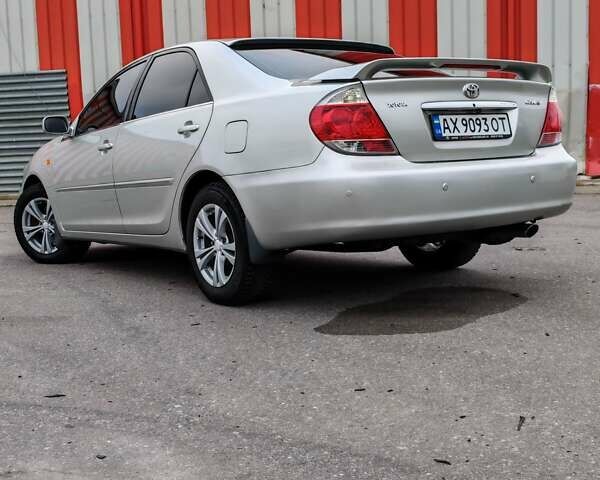 Сірий Тойота Камрі, об'ємом двигуна 3 л та пробігом 317 тис. км за 7700 $, фото 29 на Automoto.ua