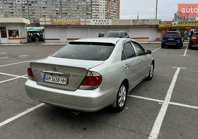 Сірий Тойота Камрі, об'ємом двигуна 3 л та пробігом 346 тис. км за 6270 $, фото 3 на Automoto.ua