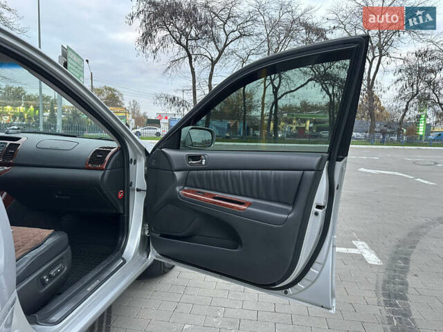 Серый Тойота Камри, объемом двигателя 2.36 л и пробегом 220 тыс. км за 6200 $, фото 33 на Automoto.ua