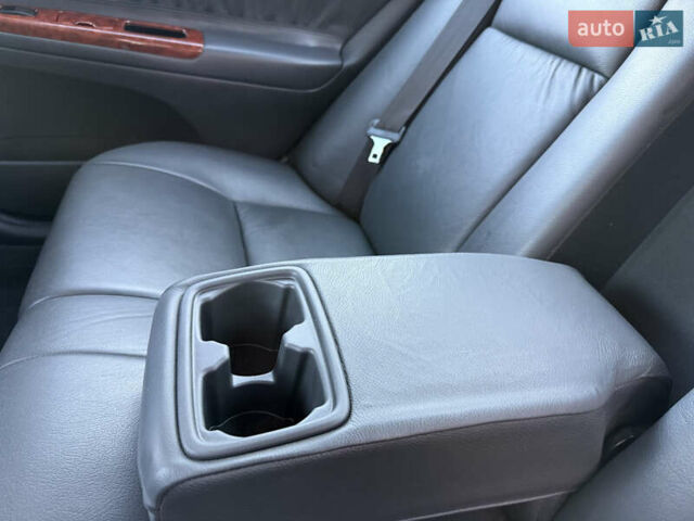 Серый Тойота Камри, объемом двигателя 2.4 л и пробегом 42 тыс. км за 10900 $, фото 98 на Automoto.ua