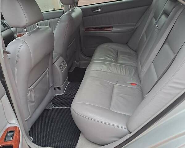 Серый Тойота Камри, объемом двигателя 2.4 л и пробегом 245 тыс. км за 7500 $, фото 8 на Automoto.ua