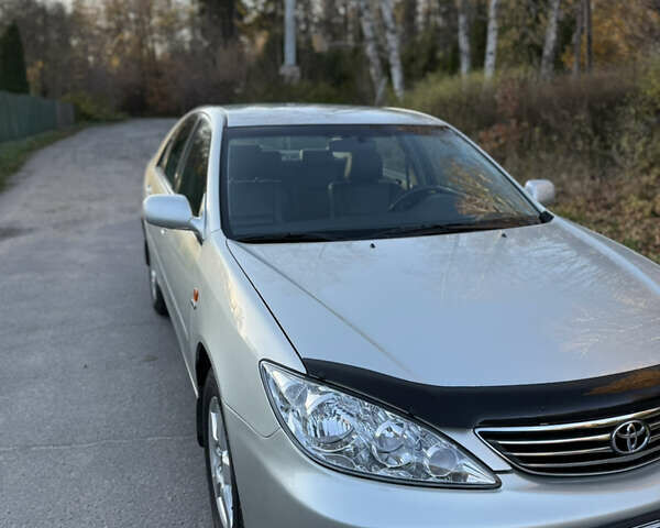 Серый Тойота Камри, объемом двигателя 2.4 л и пробегом 42 тыс. км за 10900 $, фото 27 на Automoto.ua