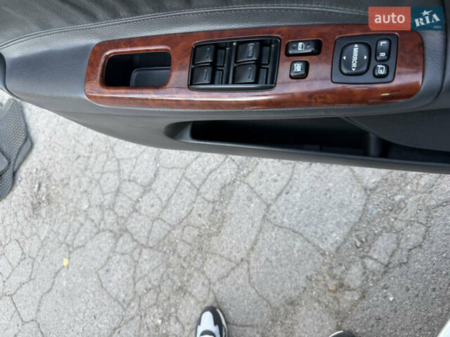 Серый Тойота Камри, объемом двигателя 2.4 л и пробегом 42 тыс. км за 10900 $, фото 70 на Automoto.ua