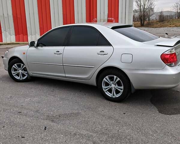 Сірий Тойота Камрі, об'ємом двигуна 3 л та пробігом 317 тис. км за 7700 $, фото 6 на Automoto.ua