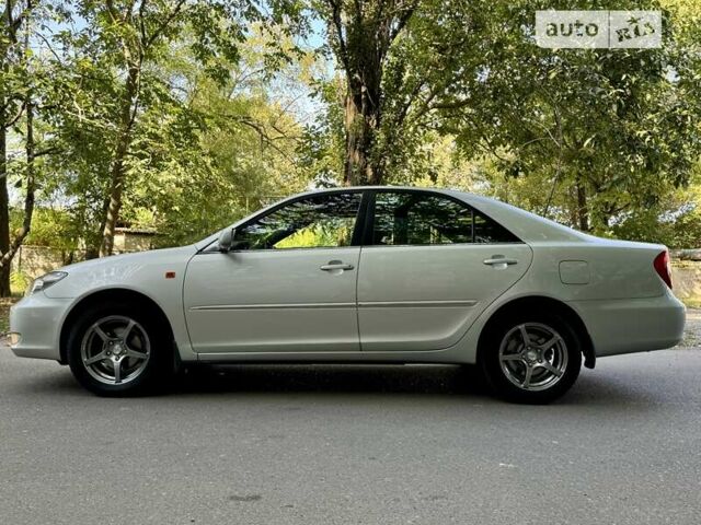 Серый Тойота Камри, объемом двигателя 2.36 л и пробегом 213 тыс. км за 6300 $, фото 13 на Automoto.ua