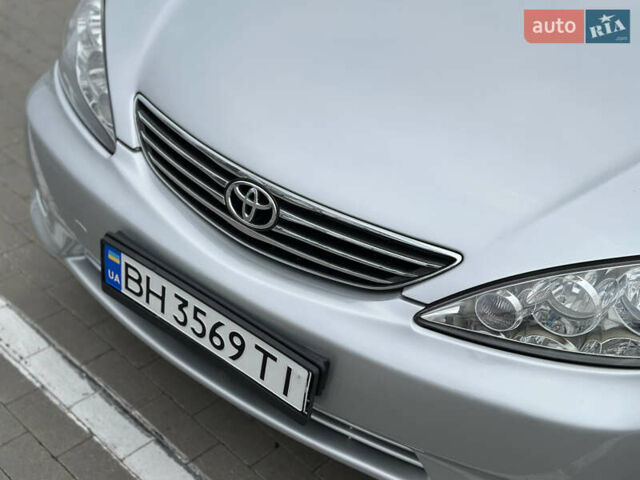 Серый Тойота Камри, объемом двигателя 2.36 л и пробегом 220 тыс. км за 6200 $, фото 16 на Automoto.ua