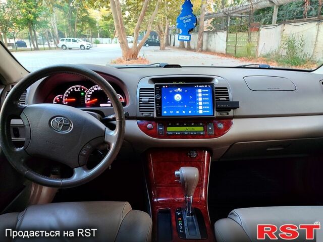 Серый Тойота Камри, объемом двигателя 2.4 л и пробегом 185 тыс. км за 7999 $, фото 8 на Automoto.ua