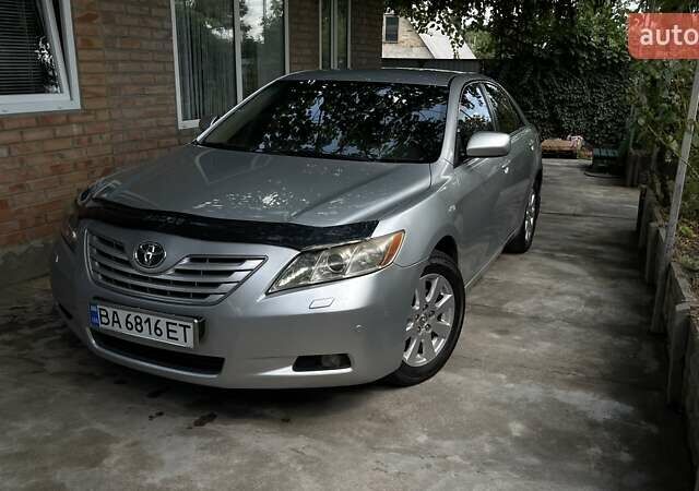 Серый Тойота Камри, объемом двигателя 3.46 л и пробегом 155 тыс. км за 8000 $, фото 24 на Automoto.ua