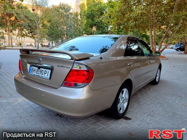 Серый Тойота Камри, объемом двигателя 2.4 л и пробегом 185 тыс. км за 7999 $, фото 4 на Automoto.ua