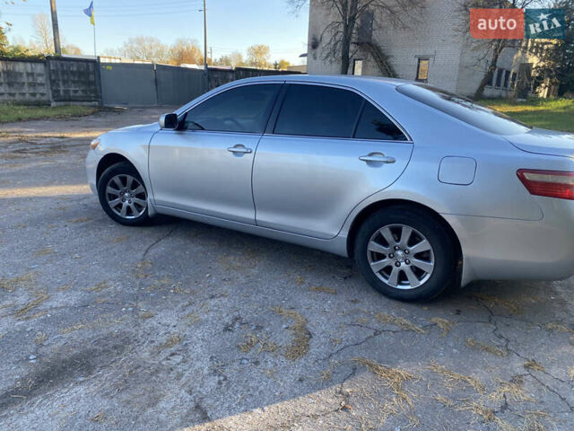 Серый Тойота Камри, объемом двигателя 2.4 л и пробегом 272 тыс. км за 7500 $, фото 12 на Automoto.ua