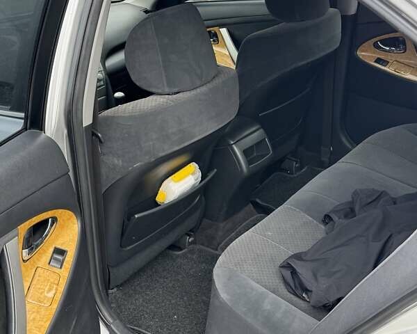 Серый Тойота Камри, объемом двигателя 2.36 л и пробегом 252 тыс. км за 7999 $, фото 4 на Automoto.ua