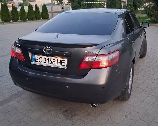 Серый Тойота Камри, объемом двигателя 2.4 л и пробегом 290 тыс. км за 6600 $, фото 10 на Automoto.ua