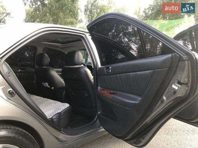 Серый Тойота Камри, объемом двигателя 2.4 л и пробегом 267 тыс. км за 8600 $, фото 18 на Automoto.ua