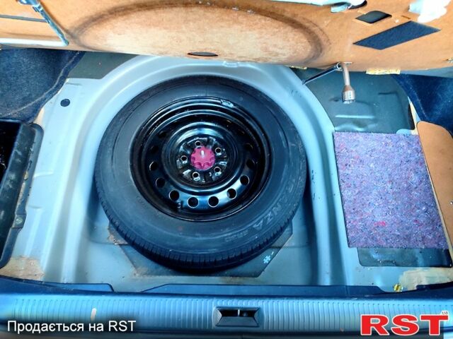 Серый Тойота Камри, объемом двигателя 2.4 л и пробегом 185 тыс. км за 7999 $, фото 7 на Automoto.ua