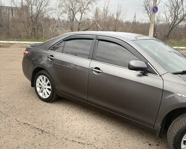 Сірий Тойота Камрі, об'ємом двигуна 3.46 л та пробігом 246 тис. км за 9200 $, фото 1 на Automoto.ua