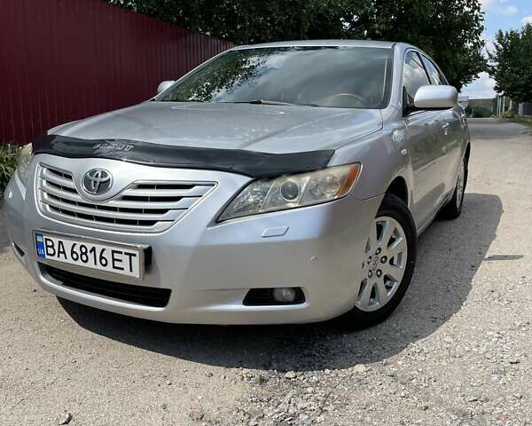 Серый Тойота Камри, объемом двигателя 3.46 л и пробегом 155 тыс. км за 8000 $, фото 1 на Automoto.ua