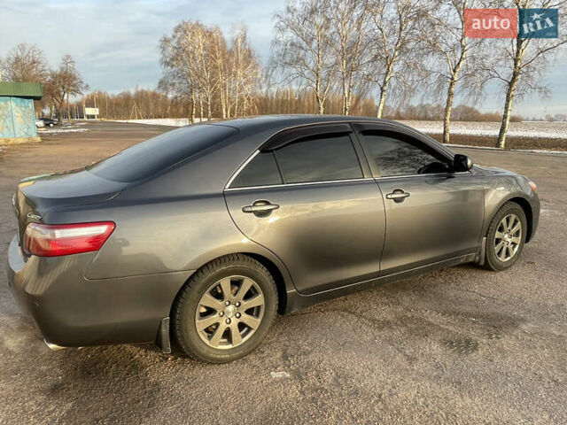Серый Тойота Камри, объемом двигателя 3.5 л и пробегом 306 тыс. км за 7500 $, фото 1 на Automoto.ua