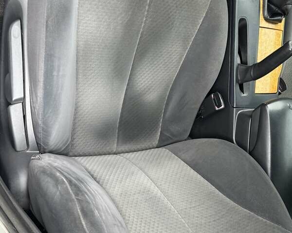 Серый Тойота Камри, объемом двигателя 2.36 л и пробегом 252 тыс. км за 7999 $, фото 6 на Automoto.ua