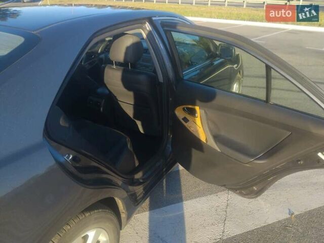 Серый Тойота Камри, объемом двигателя 2.36 л и пробегом 352 тыс. км за 8000 $, фото 16 на Automoto.ua