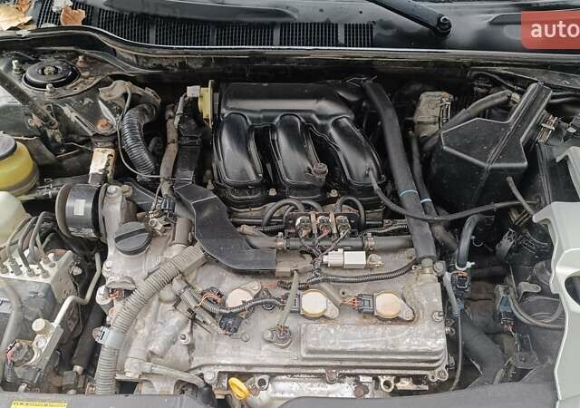 Серый Тойота Камри, объемом двигателя 3.46 л и пробегом 338 тыс. км за 6300 $, фото 6 на Automoto.ua