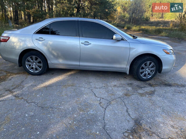 Серый Тойота Камри, объемом двигателя 2.4 л и пробегом 272 тыс. км за 7500 $, фото 16 на Automoto.ua