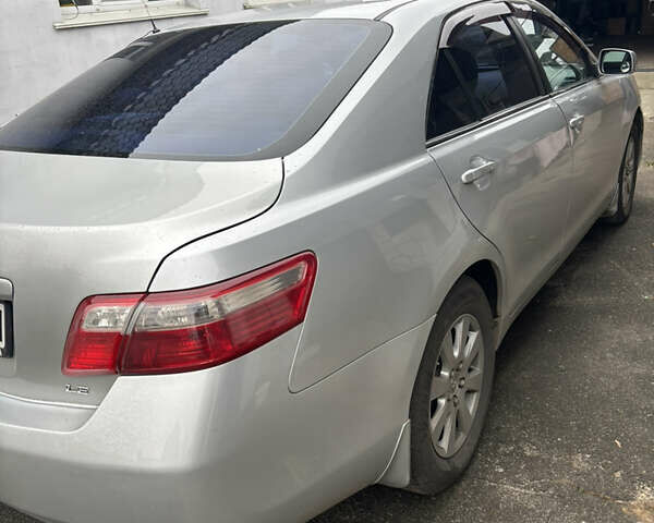 Серый Тойота Камри, объемом двигателя 2.36 л и пробегом 250 тыс. км за 7500 $, фото 3 на Automoto.ua