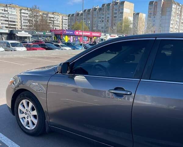 Сірий Тойота Камрі, об'ємом двигуна 2.4 л та пробігом 260 тис. км за 8700 $, фото 3 на Automoto.ua
