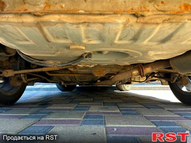 Серый Тойота Камри, объемом двигателя 2.4 л и пробегом 223 тыс. км за 8800 $, фото 7 на Automoto.ua