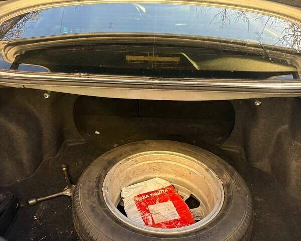 Сірий Тойота Камрі, об'ємом двигуна 2.36 л та пробігом 319 тис. км за 7900 $, фото 12 на Automoto.ua