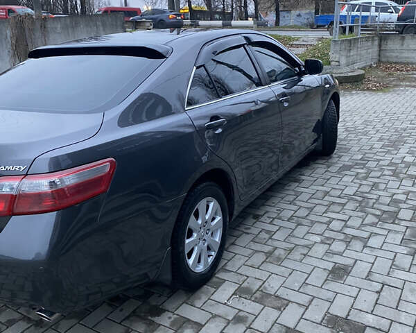 Серый Тойота Камри, объемом двигателя 2.4 л и пробегом 240 тыс. км за 7600 $, фото 11 на Automoto.ua