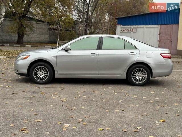 Серый Тойота Камри, объемом двигателя 2.4 л и пробегом 225 тыс. км за 7490 $, фото 3 на Automoto.ua