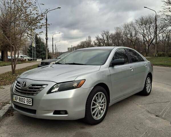 Серый Тойота Камри, объемом двигателя 2.4 л и пробегом 215 тыс. км за 6900 $, фото 1 на Automoto.ua