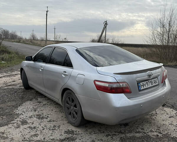 Серый Тойота Камри, объемом двигателя 2.4 л и пробегом 311 тыс. км за 7700 $, фото 4 на Automoto.ua