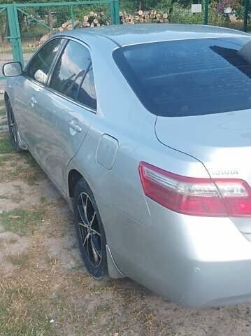 Серый Тойота Камри, объемом двигателя 2.4 л и пробегом 286 тыс. км за 9500 $, фото 6 на Automoto.ua