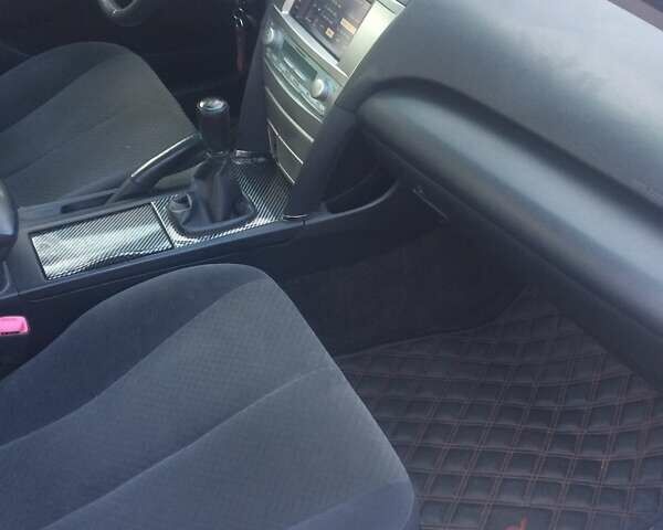 Серый Тойота Камри, объемом двигателя 2.4 л и пробегом 230 тыс. км за 8500 $, фото 6 на Automoto.ua