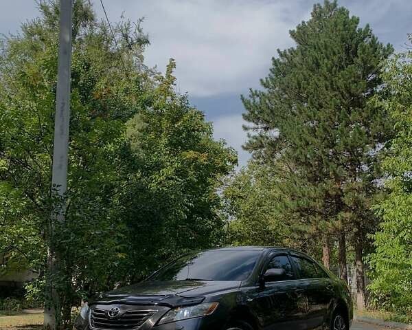 Серый Тойота Камри, объемом двигателя 2.4 л и пробегом 238 тыс. км за 9100 $, фото 5 на Automoto.ua