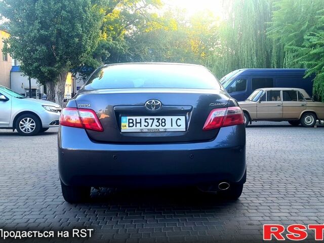 Серый Тойота Камри, объемом двигателя 2.4 л и пробегом 167 тыс. км за 9100 $, фото 1 на Automoto.ua