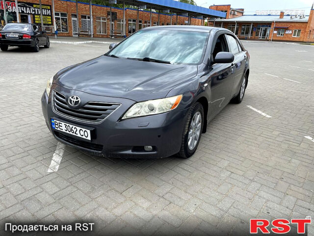 Серый Тойота Камри, объемом двигателя 2.4 л и пробегом 240 тыс. км за 7700 $, фото 6 на Automoto.ua