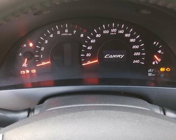Серый Тойота Камри, объемом двигателя 2.4 л и пробегом 230 тыс. км за 8500 $, фото 46 на Automoto.ua