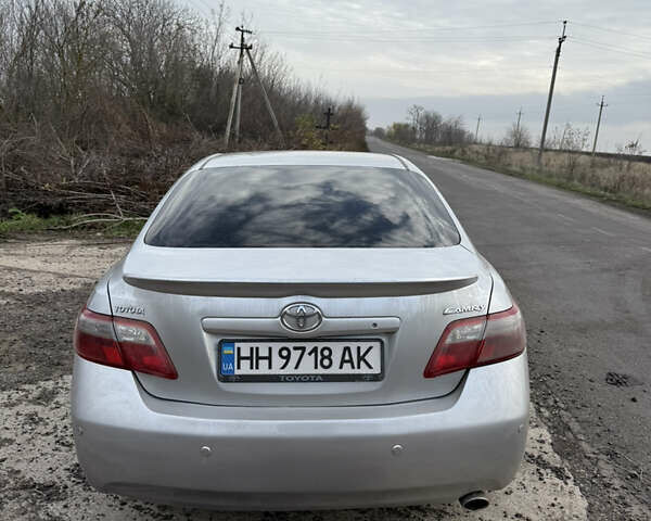 Серый Тойота Камри, объемом двигателя 2.4 л и пробегом 311 тыс. км за 7700 $, фото 6 на Automoto.ua