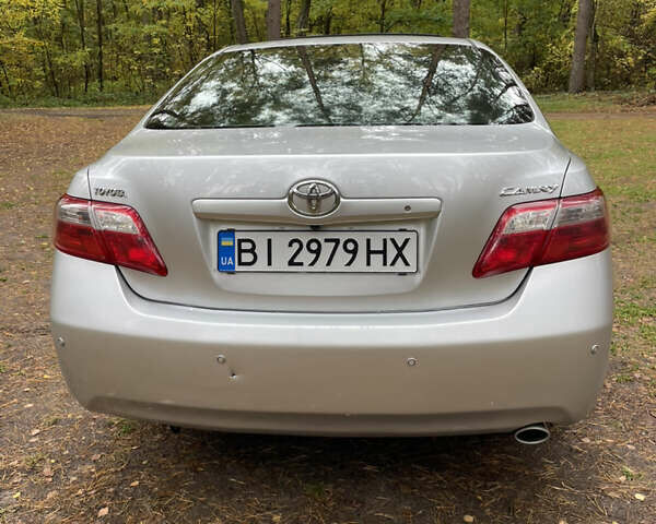 Серый Тойота Камри, объемом двигателя 2.36 л и пробегом 370 тыс. км за 6999 $, фото 4 на Automoto.ua